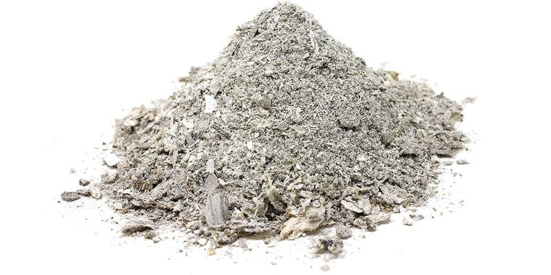 A pile of ash displayed against a white background.