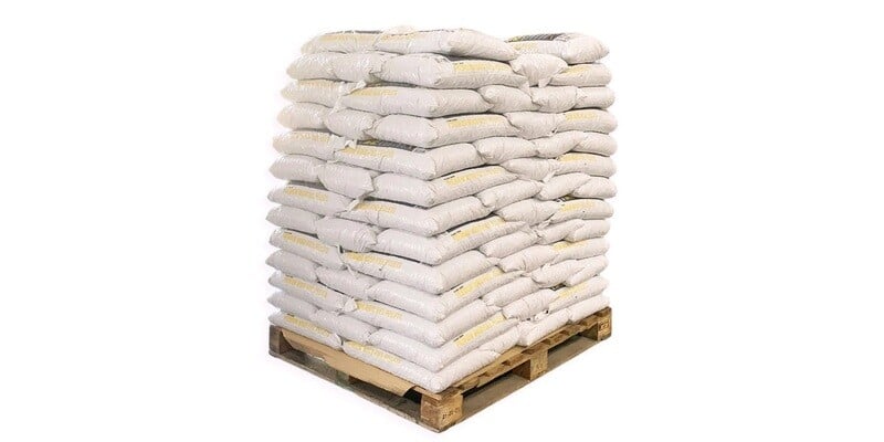 A pallet full of 100 bags of Flame Genie Premium Hardwood Pellets. The bags and pallet are displayed against a white background.