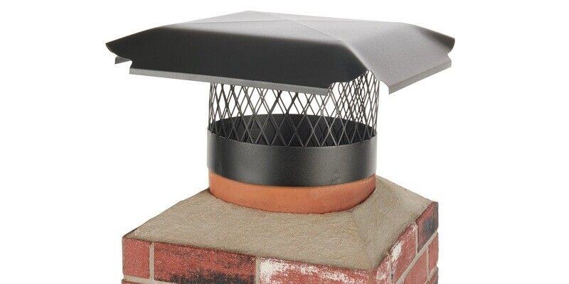 A Draft King Galvanized Steel Round Chimney Cap installed on a round mock flue tile against a white background.